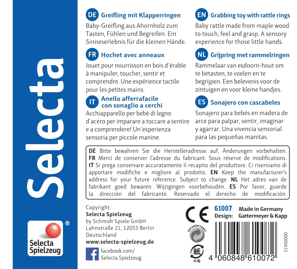 Emballage de jouet comportant des descriptions multilingues « Hochet avec anneaux », des consignes de sécurité et des logos de marque sur fond bleu.